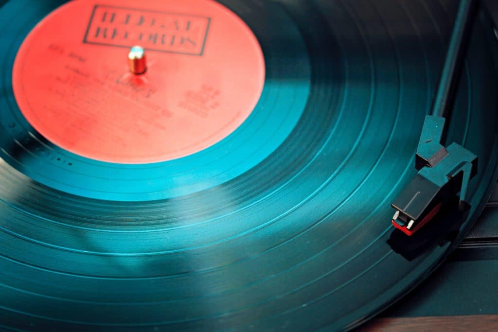 A large cut on a vinyl record can kick a needle out of its groove.