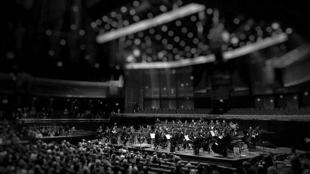 Classical music halls are designed with reverb times in mind.