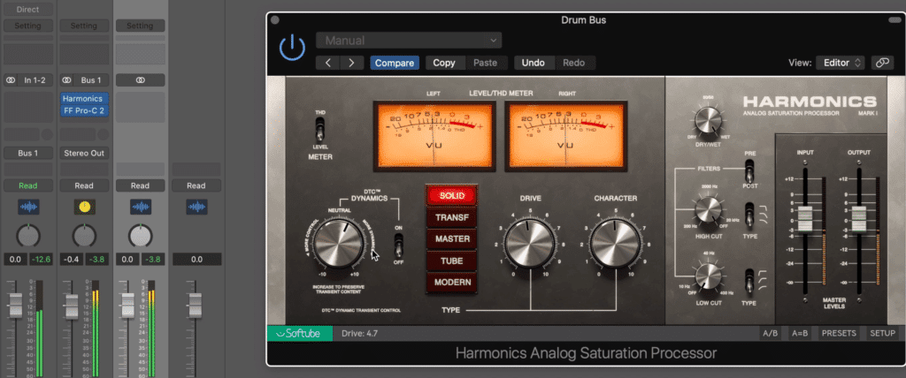 Use a harmonics plugin either before or after your drum bus compression.
